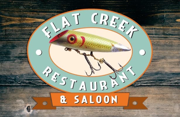 Flat Creek Restaurant & Saloon logo.